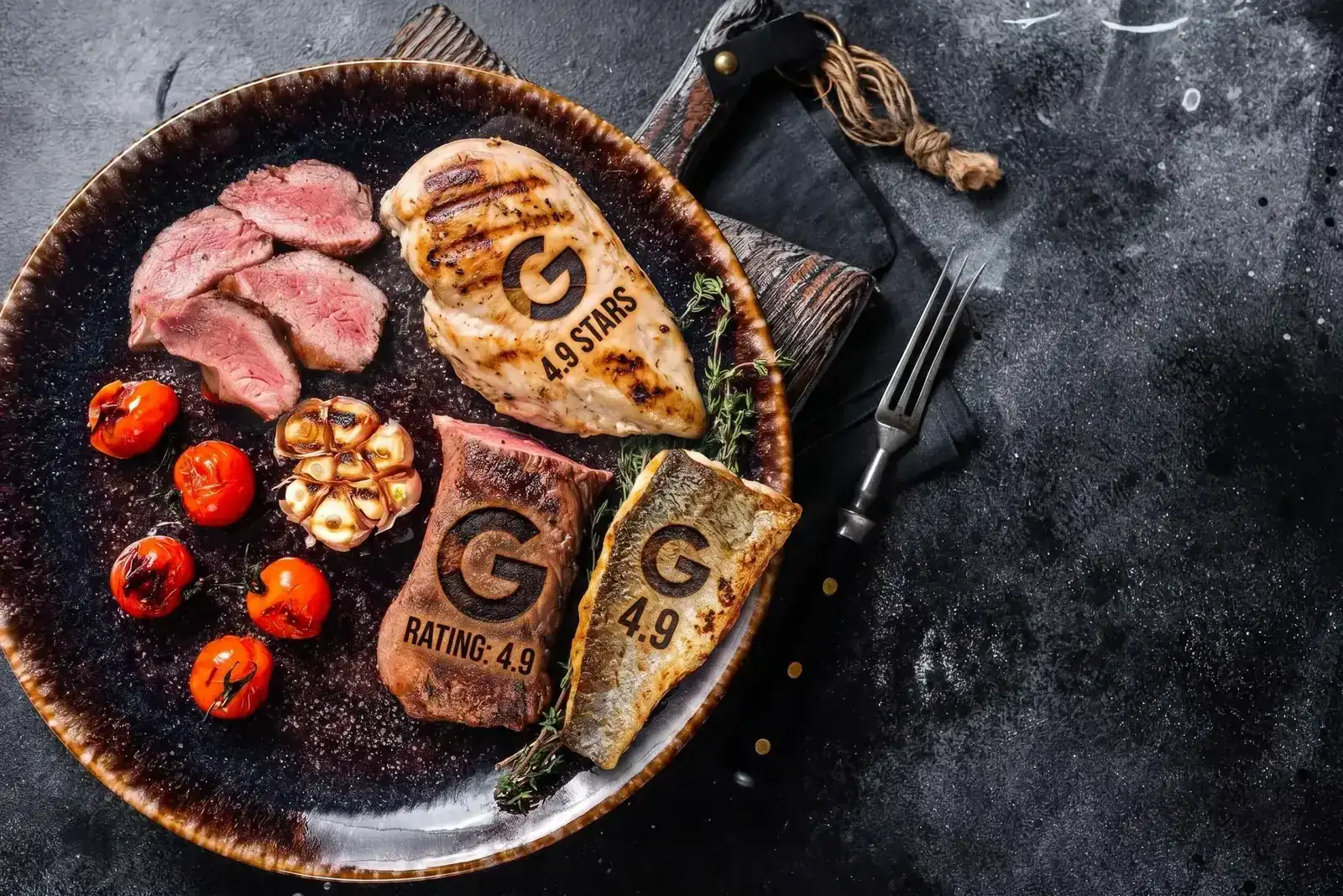 Grilled steak and chicken on a plate marked with a 4.9 star rating
